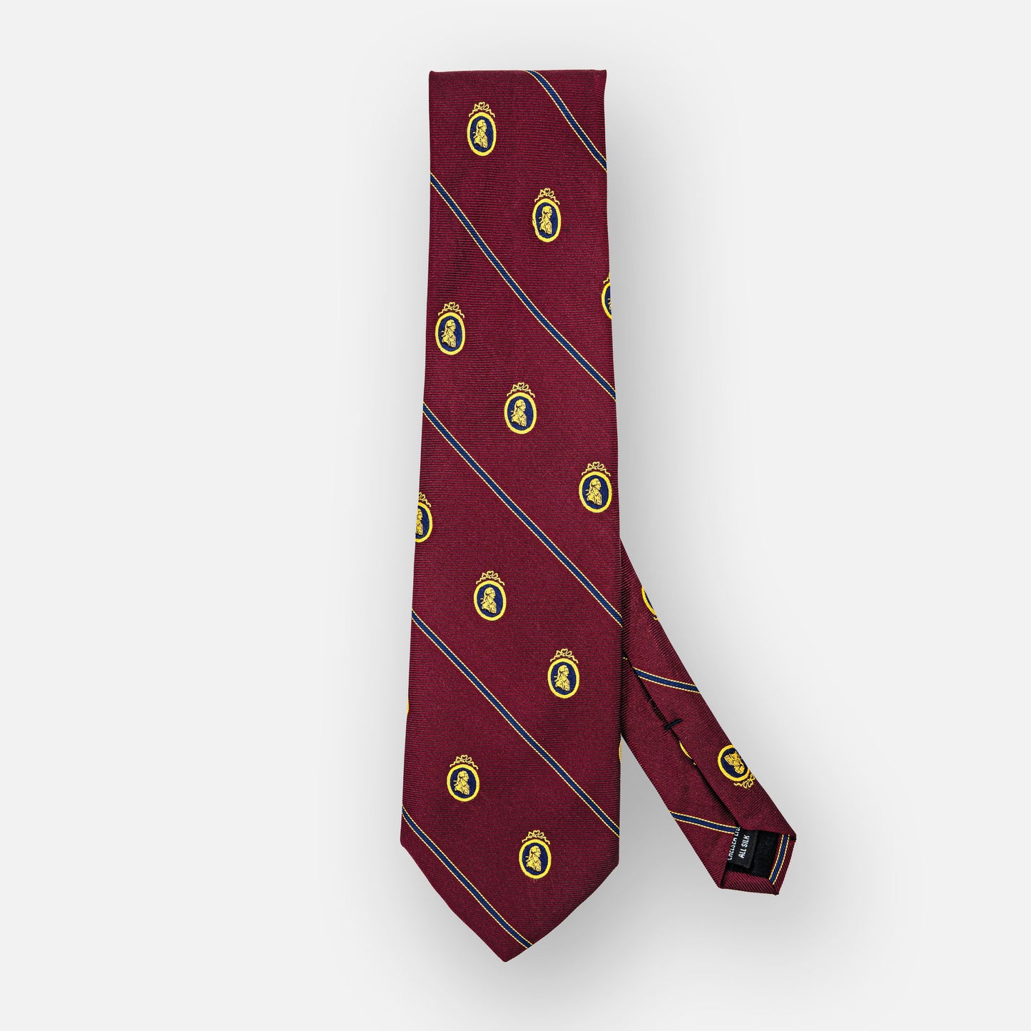 Burgundy silk tie with thin navy stripes and blue/gold portrait.
