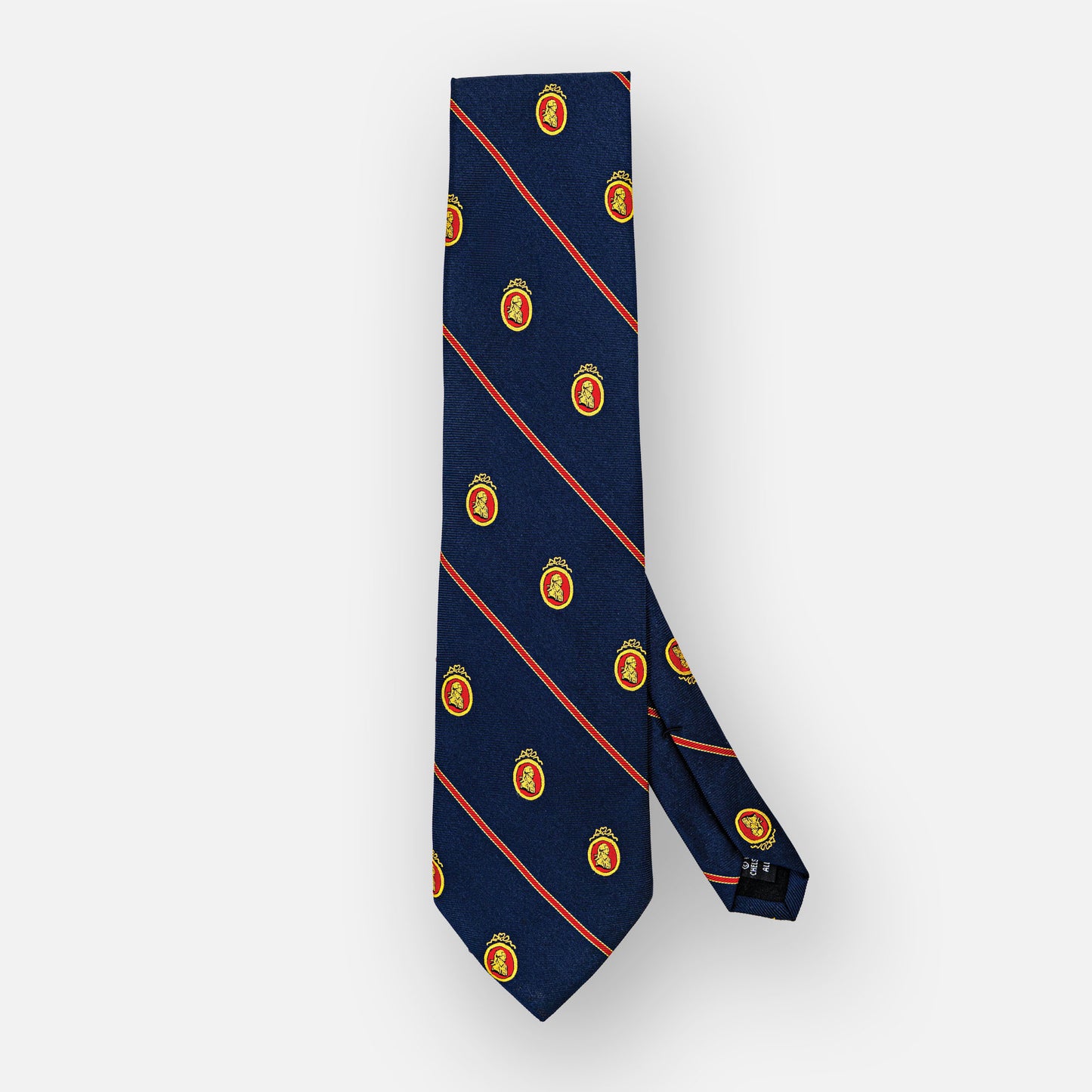 Navy silk tie with thin red stripes, and red/gold portrait.