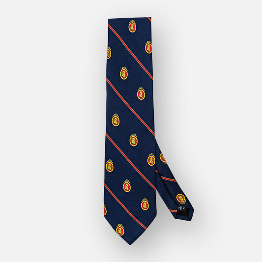Navy silk tie with thin red stripes, and red/gold portrait.