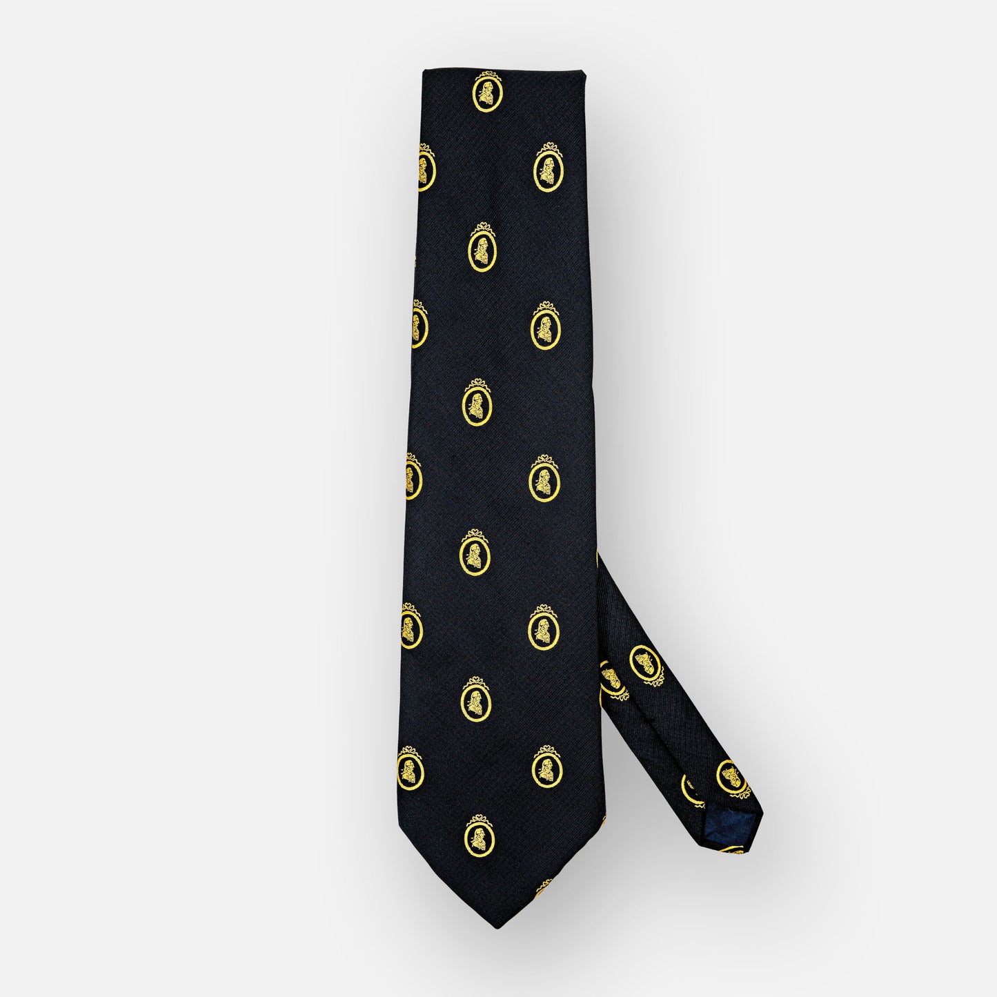Black polyester tie with repeating gold portrait medallions.
