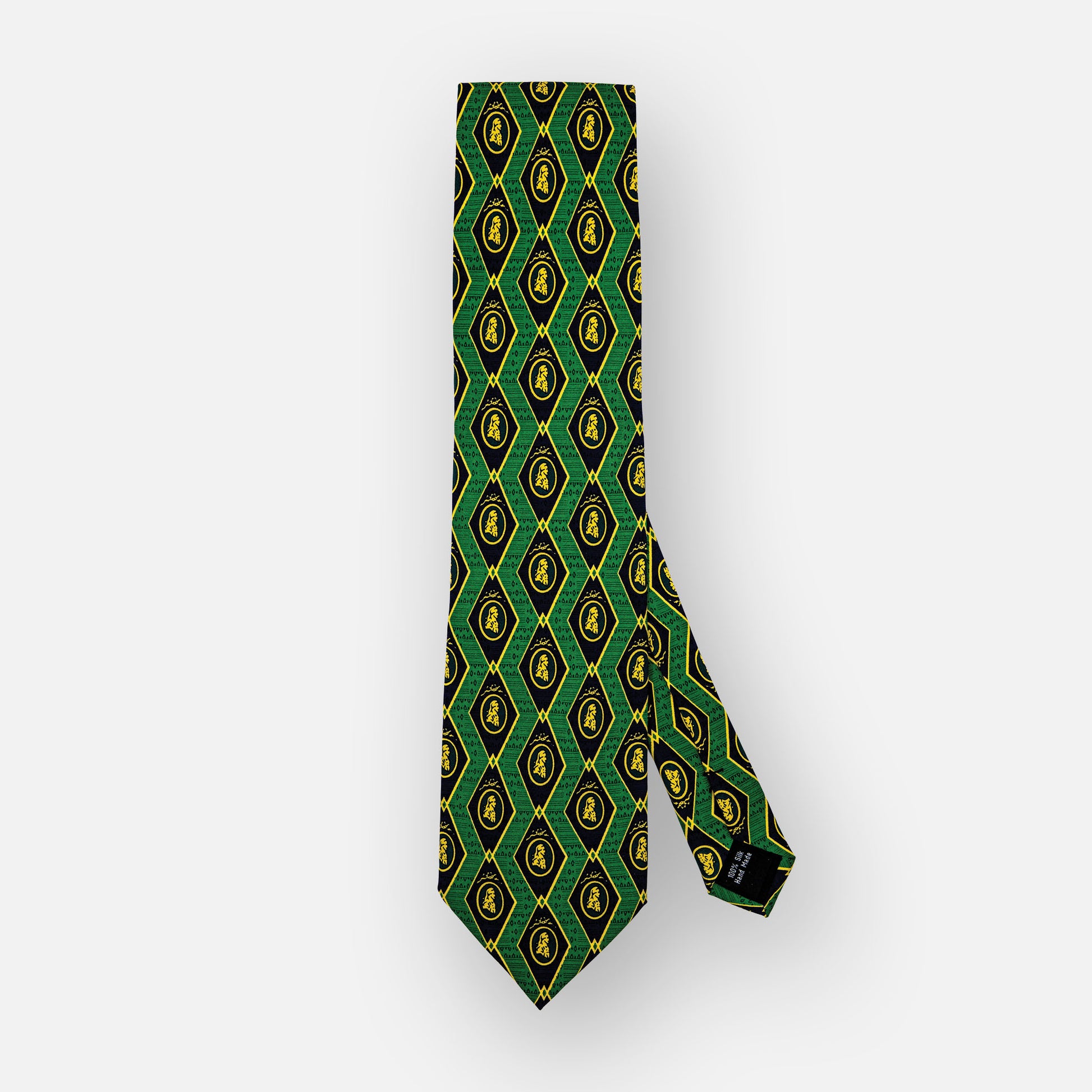 Navy and green silk tie with ivory portrait.