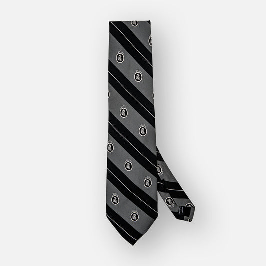 Gray and black silk tie with striped design/white portrait.